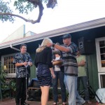 Giving a lei to one of our student winners