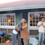 Giving a lei to former EMWP program Manager Jordan in recognition of 20 years