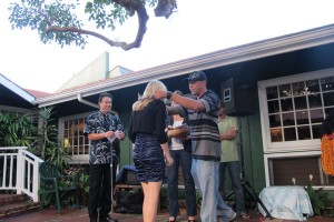 Giving a lei to our student winner